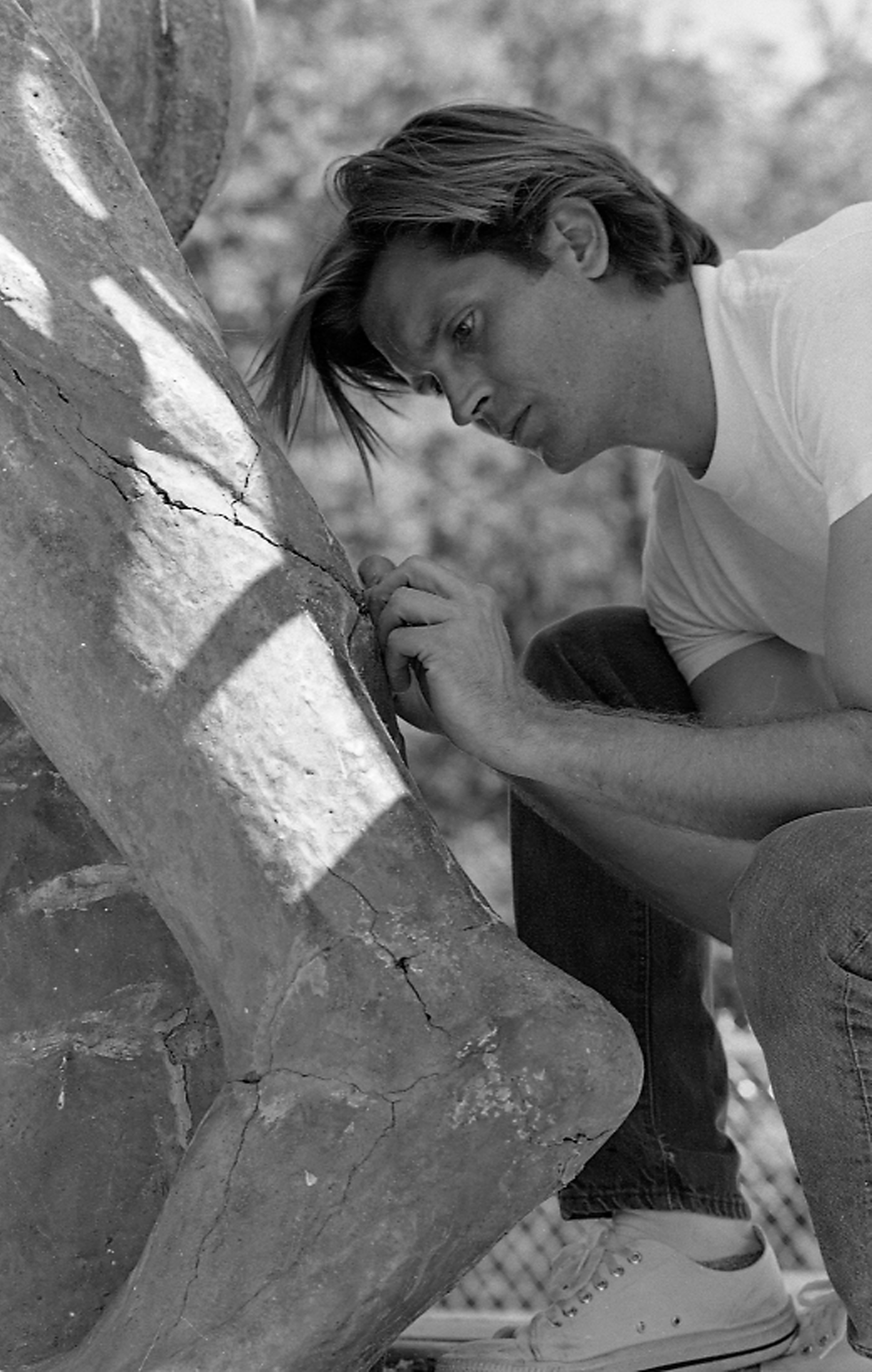Man repairing Sparty's Heel, 1988