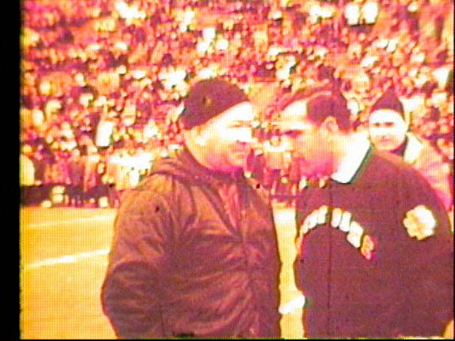 Duffy Daugherty and Ara Parseghian talking, 1966