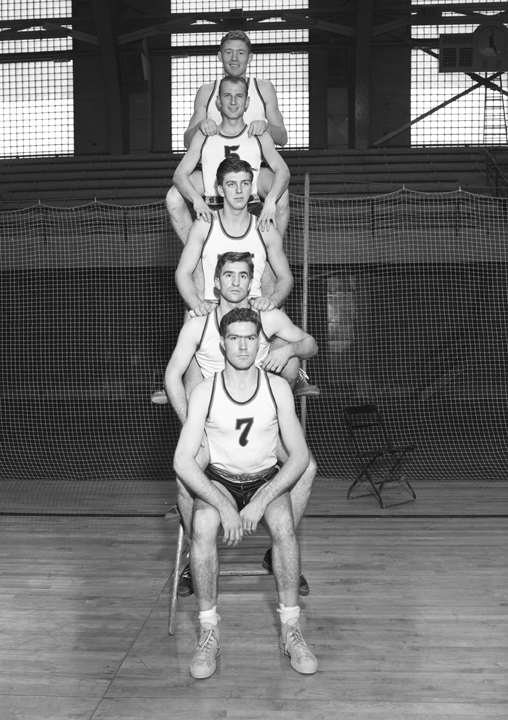 Basketball Players Sitting/Standing in a Row