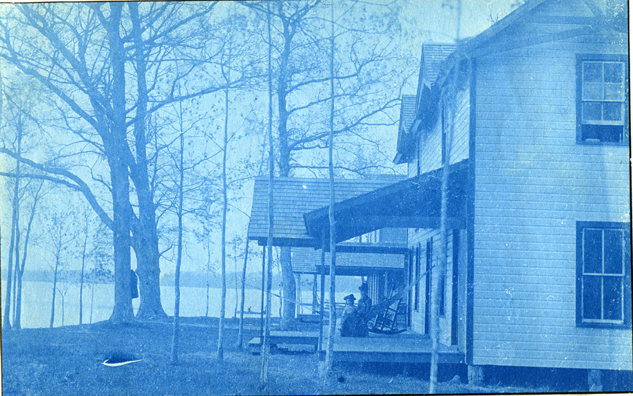 09. Woman and child sitting on the porch, circa 1888.
