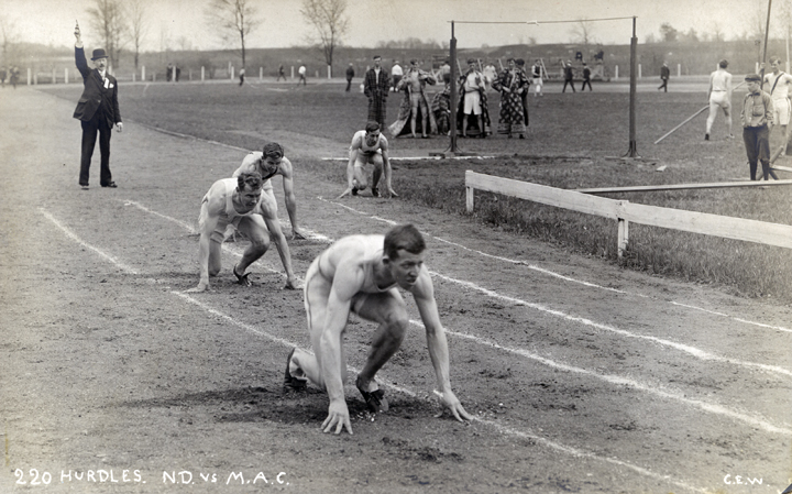 Start of the 220 Hurdles race, Notre Dame vs. M.A.C.