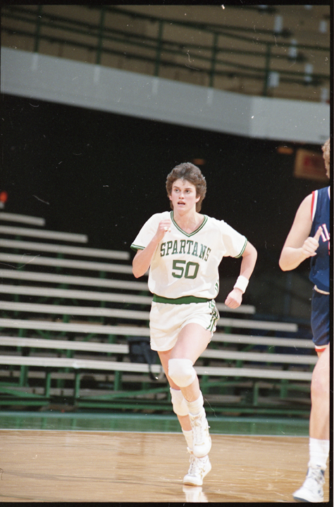 Sue Tucker running down court