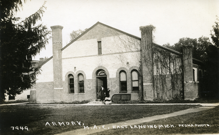 Two ladies exiting the Armory