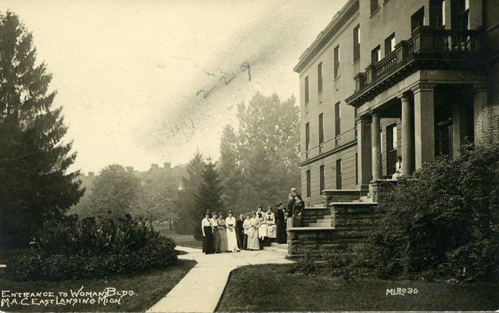 A group of women standing in front of Morrill Hall