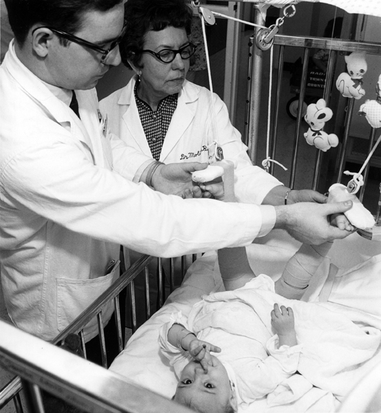 College of Human Medicine
Student Tends Daughter