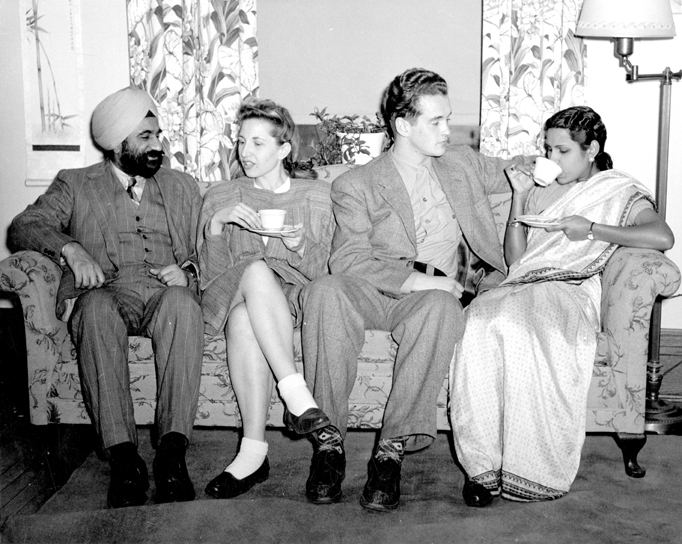 Four students have tea at the International Club.