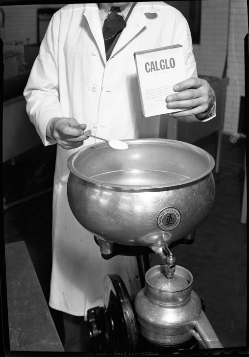 J.M. Jensen Holding up box of Calglo