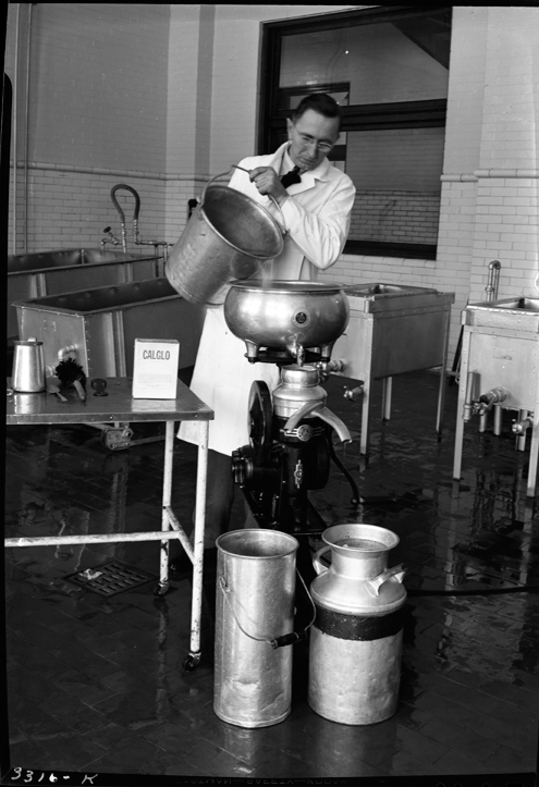 J.M. Jensen Pouring a Pail
