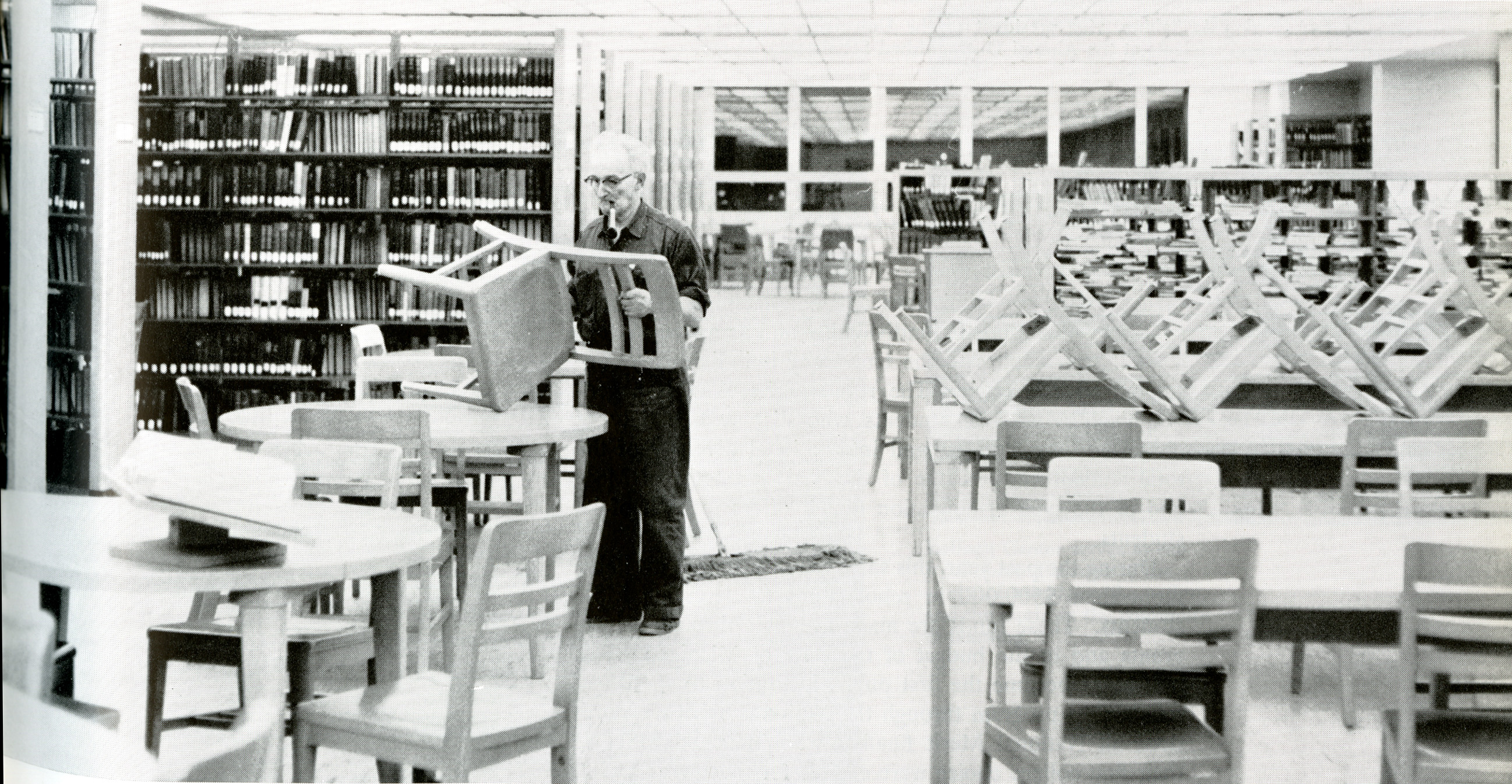 Man cleaning the library