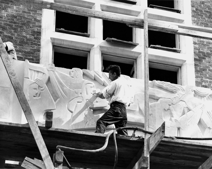 An artist works on the Union Building, 1948