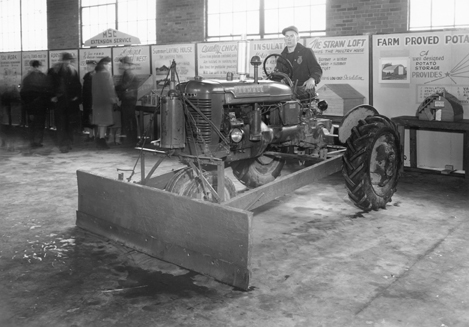 The Cooperative Extension Service at an exhibit, unknown date