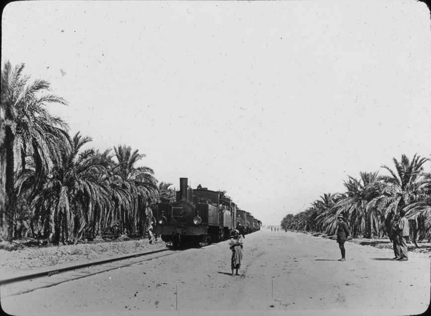 Train at rural Algerian stop, undated
