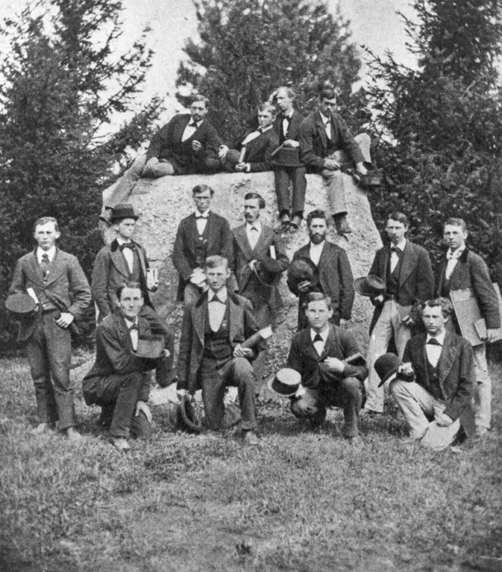 Students pose for a picture by the Rock, circa 1875