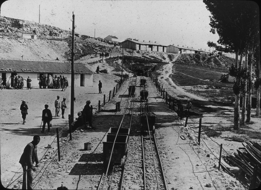 Mine entrance in Algeria with rock transport lines, undated