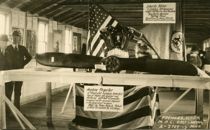 Two men with an airplane propeller, 1919
