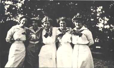 Five students pose for a picture, ca. 1910