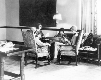 Students playing cards, circa 1930s