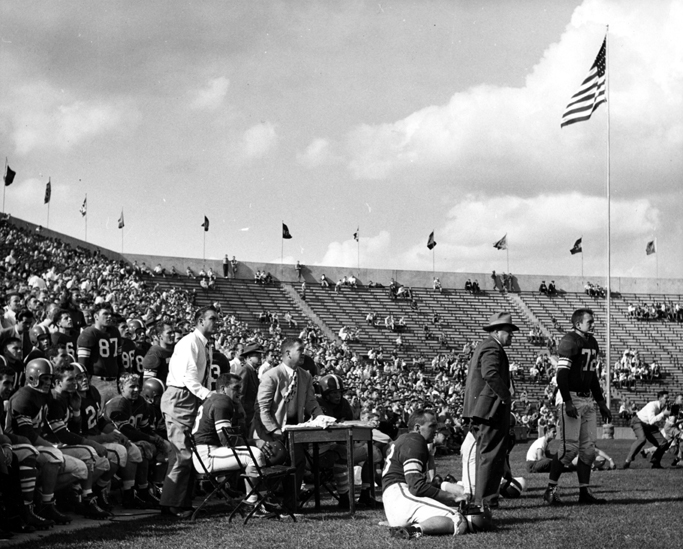 Captain Voegler and the coach on the sidelines, 1950