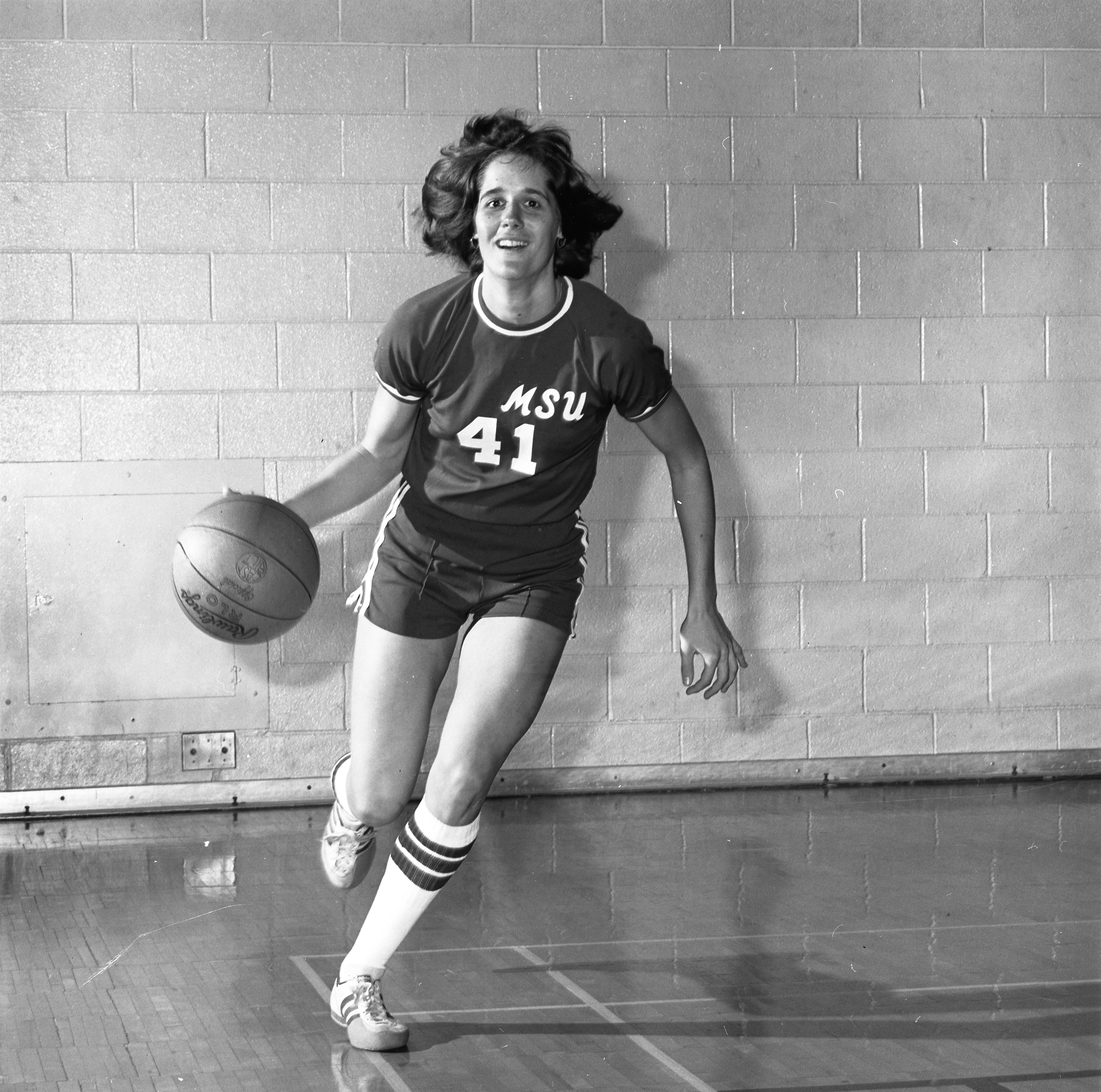 Action shot of Women's Basketball Player #41