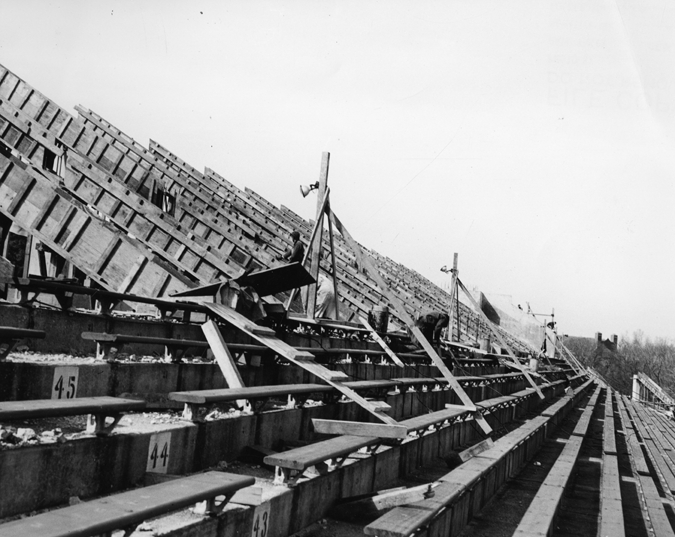 Men work on the construction of Macklin Field, 1948