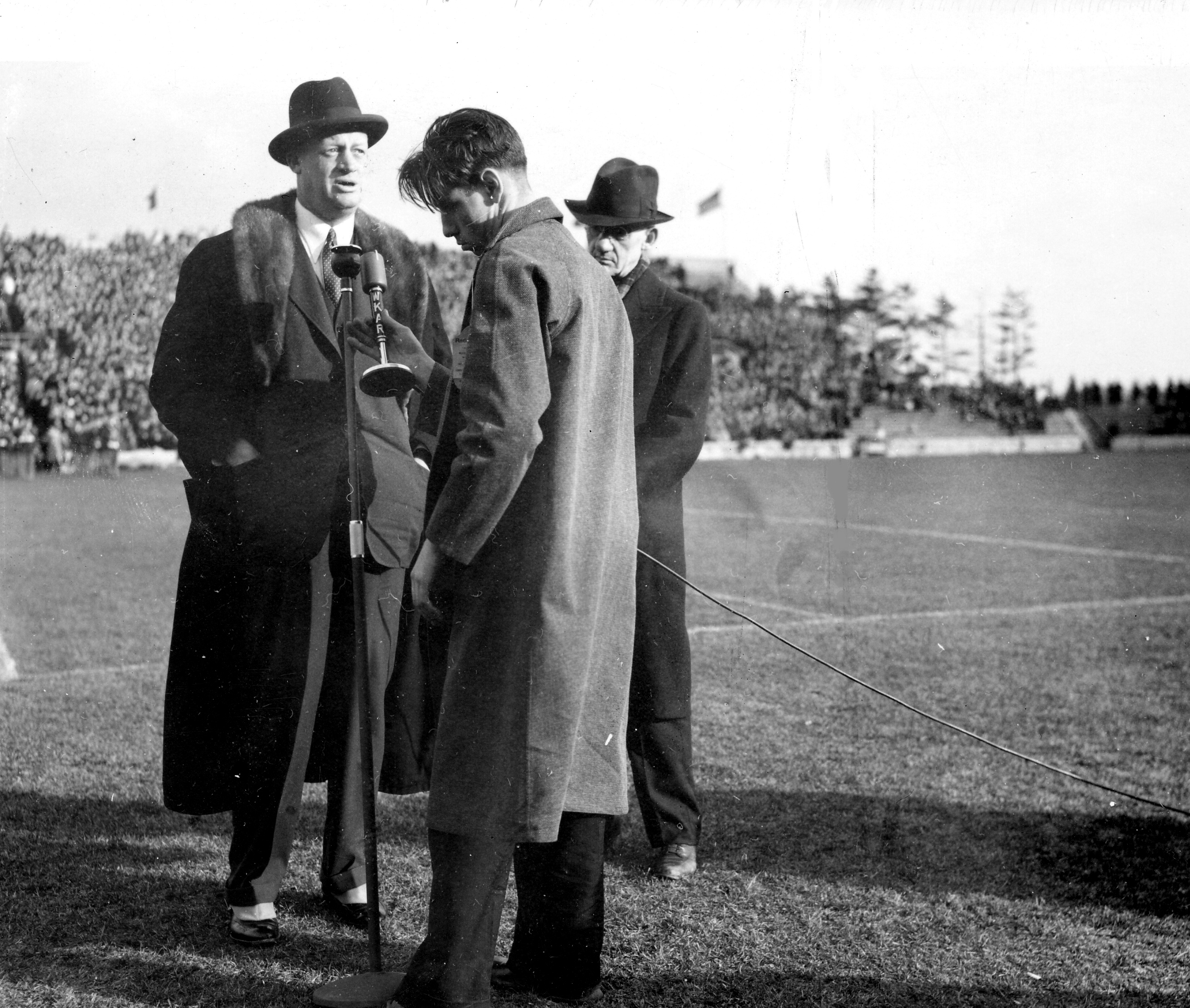 Coaches Macklin and Shaw address a crowd, date unknown