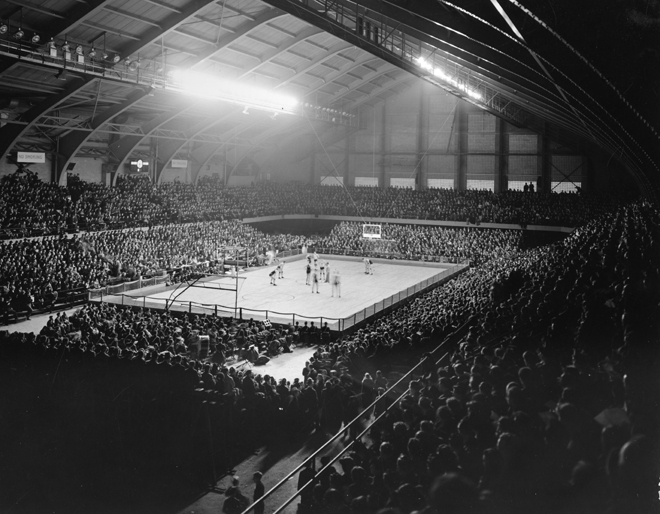 A large crowd watches an MSU basketball game, 1940