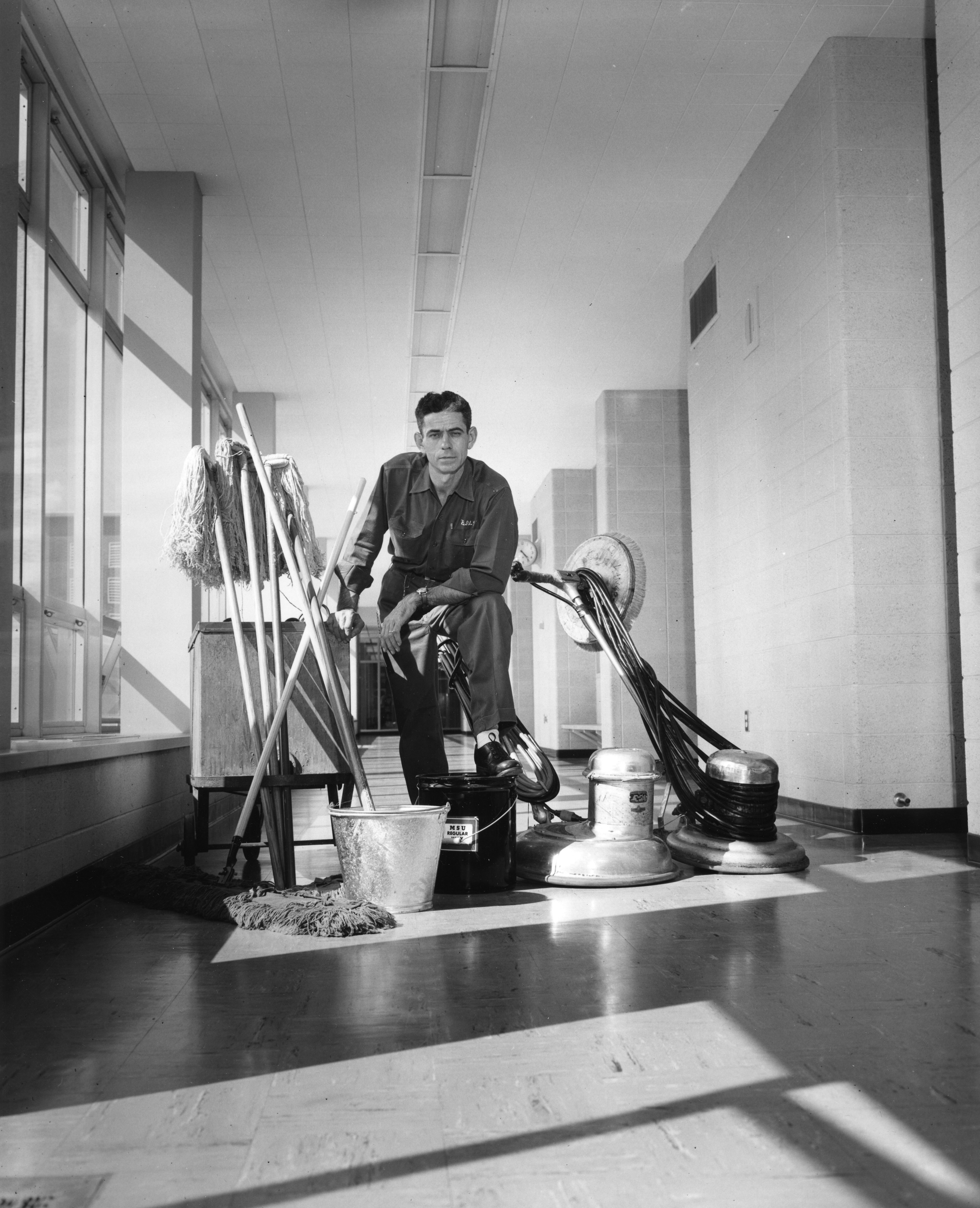 A custodian with supplies, 1958