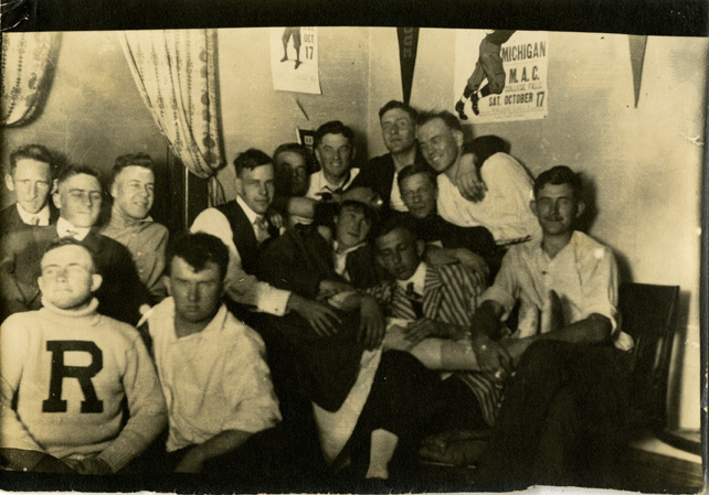 Male Students Hanging out in a Dorm Room