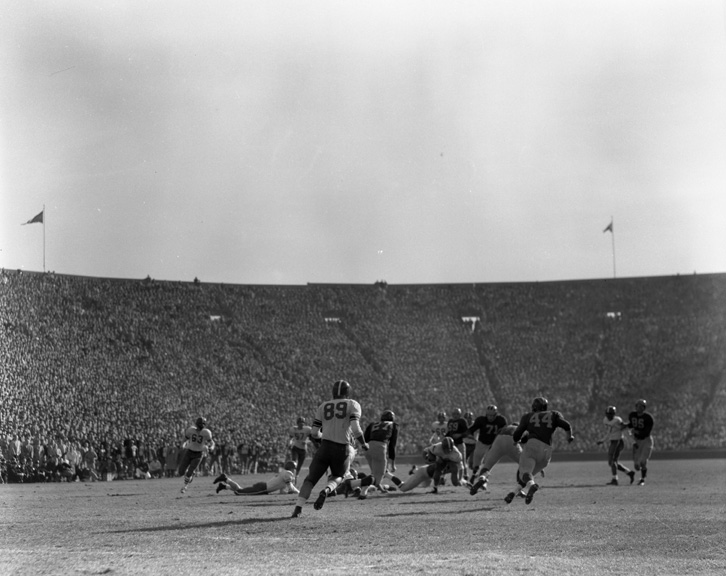 Michigan State vs. University of Michigan football action shot, 1954