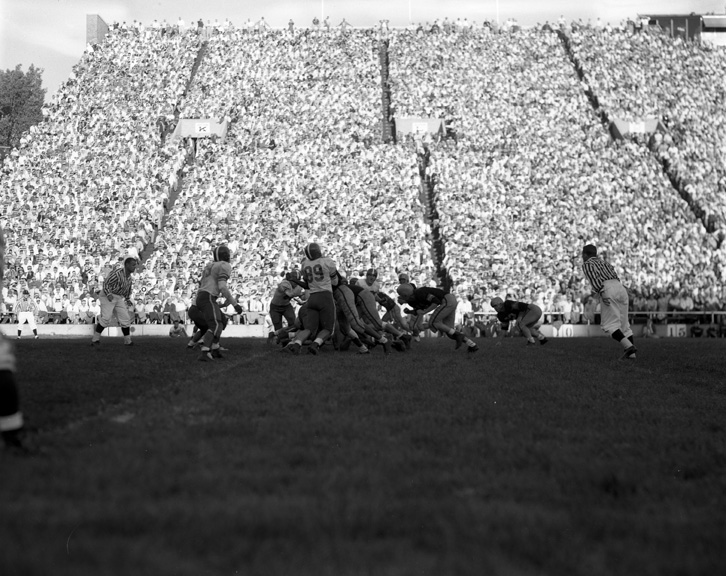 Michigan State vs. Iowa football action shot, 1954
