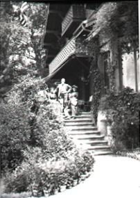 A Family on the Steps of a House, date unknown