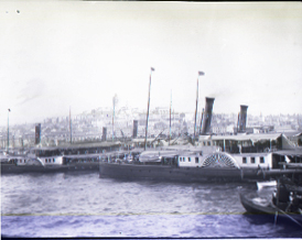 Docked boats, date unknown