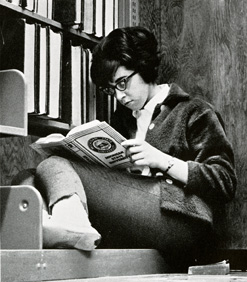 Coed studying in the library