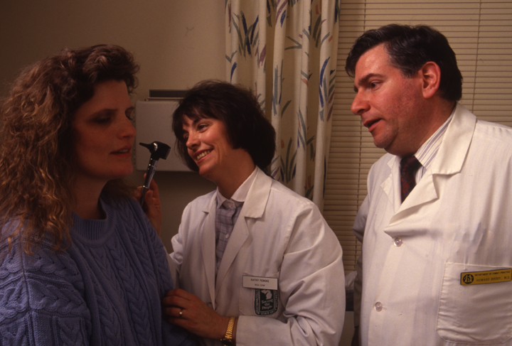 Dr. Howard Brody, CHM student Kathy Fenske and patient