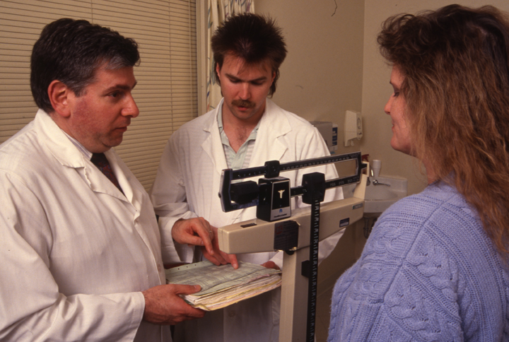 Dr. Howard Brody with unidentified CHM student and patient, circa 1992
