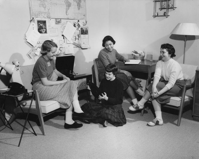 Women in dorm room playing record, 1958 Women in dorm room playing record, 1958