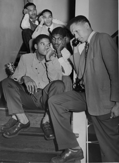 Alpha Phi Alpha members on a staircase, 1949