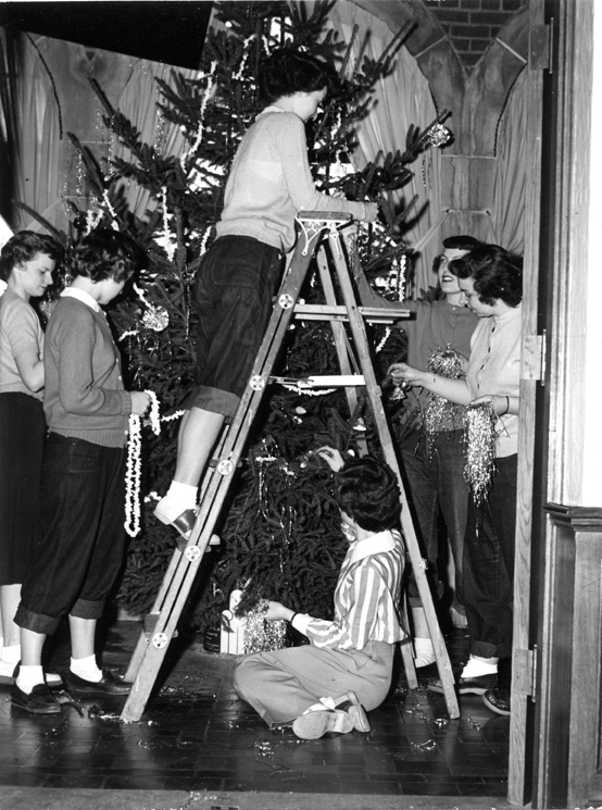 Student decorate their dormitory Christmas tree in 1948