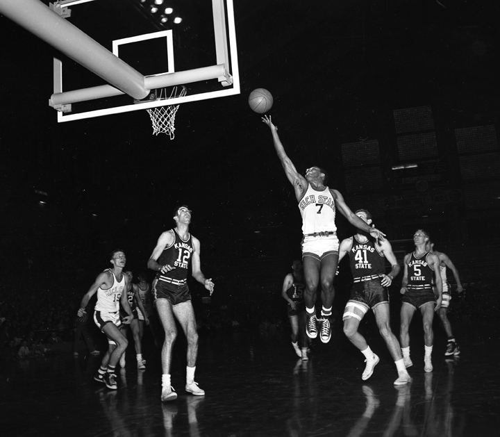  MSC Vs Kansas State basketball game with Reginald Ayala shooting a basket, 1952