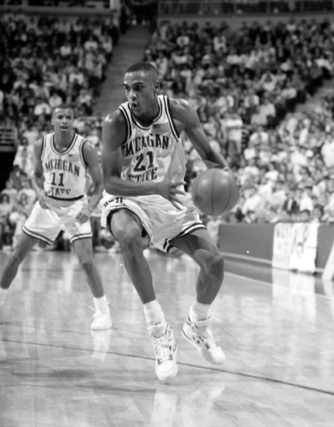 Steve Smith and Mark Montgomery on the basketball court, January 31, 1991