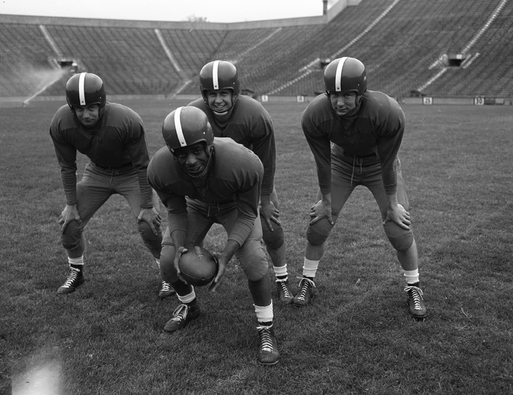 A Group Photograph of 4 Football Players