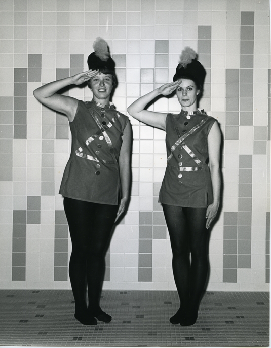 Two women in drum major outfits