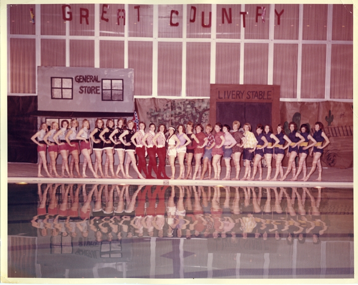 Twenty seven women posing for "It's a Great Country" (wider shot)