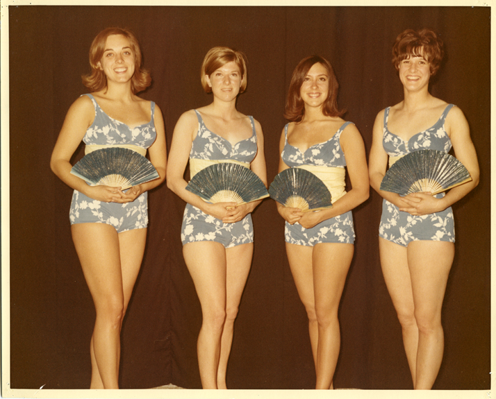 Four women with fans